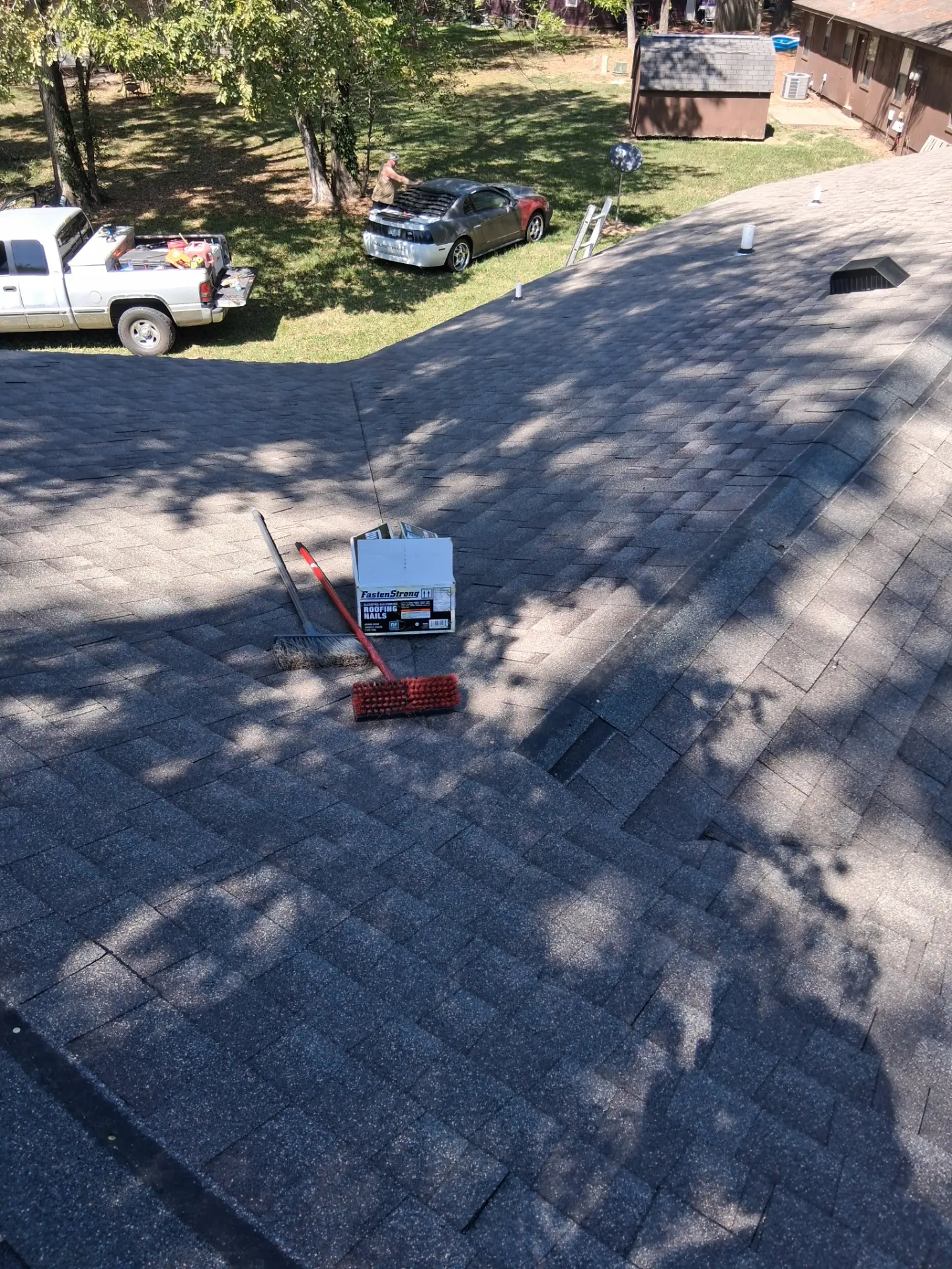 Roof replacement in progress by Boom The Builder LLC