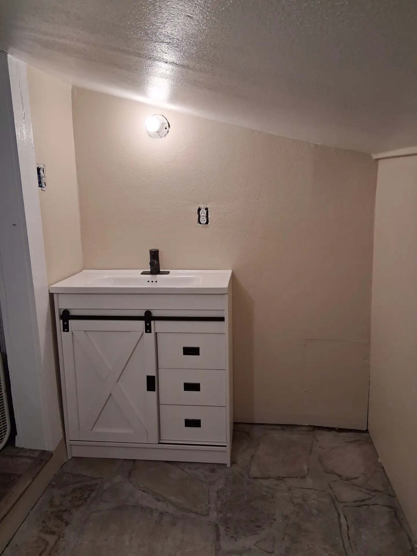 New bathroom vanity installed during a remodel
